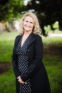portrait professional headshot of Judy, member of Flat Iron Periodontics